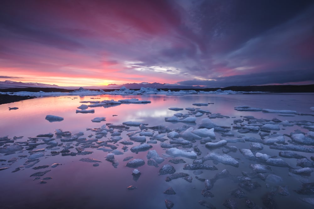 Sunset hitting icebergs